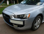 Mitsubishi Lancer X 2008- Soporte de matrícula (plástico) foto 1