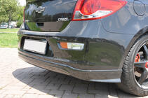 Chevrolet Cruze 2009–2015 Cubierta de parachoques trasero HB (Meliset, imprimada para pintar) foto 1