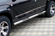 Kia Carens 1999-2012 Barras Laterales de Acero Inoxidable foto 1
