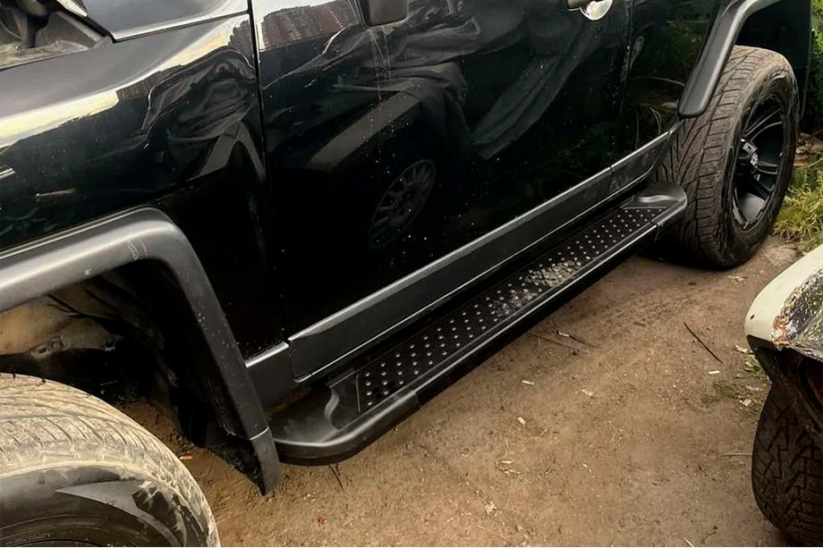 Toyota FJ Cruiser 2006-2022 Estribos Laterales Allmond Black (2 uds., aluminio) Image
