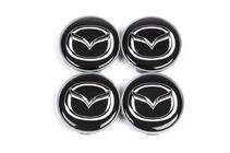 Mazda Tapacubos centrales 68/64.5 mm (4 uds) foto 2