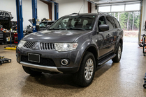 Mitsubishi Pajero Sport 2008-2015 Estribos Laterales Allmond Black (2 uds., Aluminio) foto 1