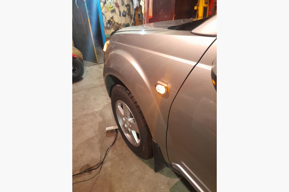 Mitsubishi Outlander 2006-2012 Rejilla para intermitente lateral Oval (2 uds, ABS) Foto 3
