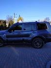 Mitsubishi Pajero Wagon III 1999-2006 Barras de techo Cromo diseño turco (2 uds) foto 6