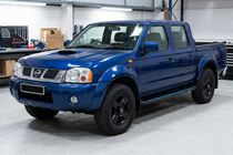 Nissan NP300 1999-2015 Estribos Laterales Maya Blue (2 uds., Aluminio) foto 1