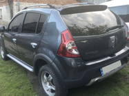 Renault Sandero 2007-2013 Alerón (imprimado para pintar) foto 3