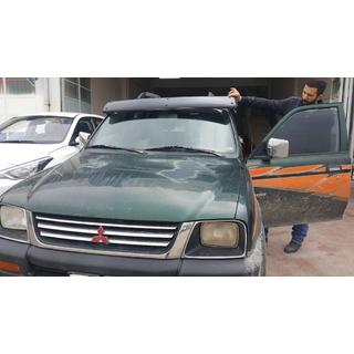 Visera parabrisas (negro brillo, 5mm) Mitsubishi L200 1996-2006 foto 4
