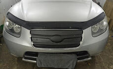 Hyundai Santa Fe 2 2006-2012 Rejilla de invierno 2005-2010 (superior) foto 1