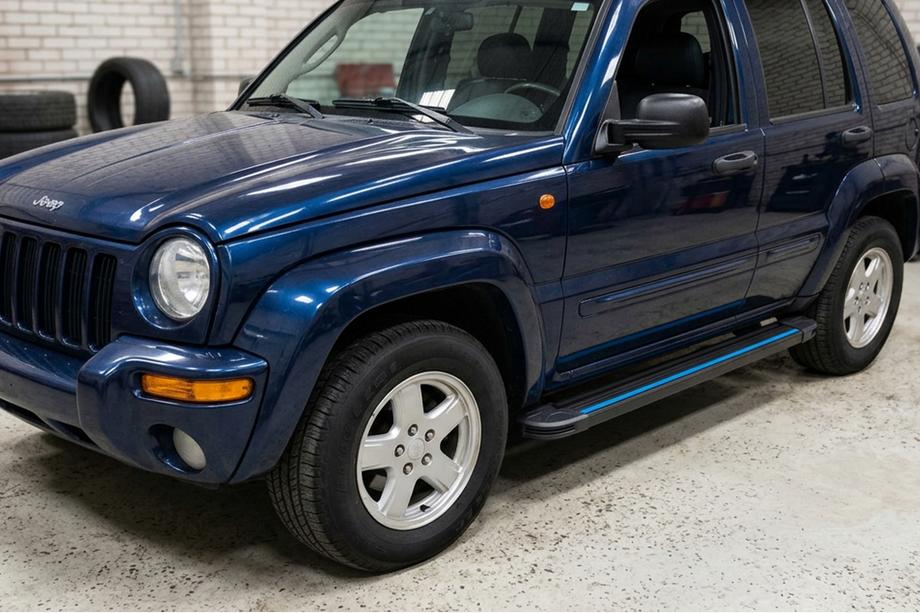 Jeep Cherokee/Liberty 2002-2007 Estribos Laterales Maya Blue (2 uds., Aluminio) Image