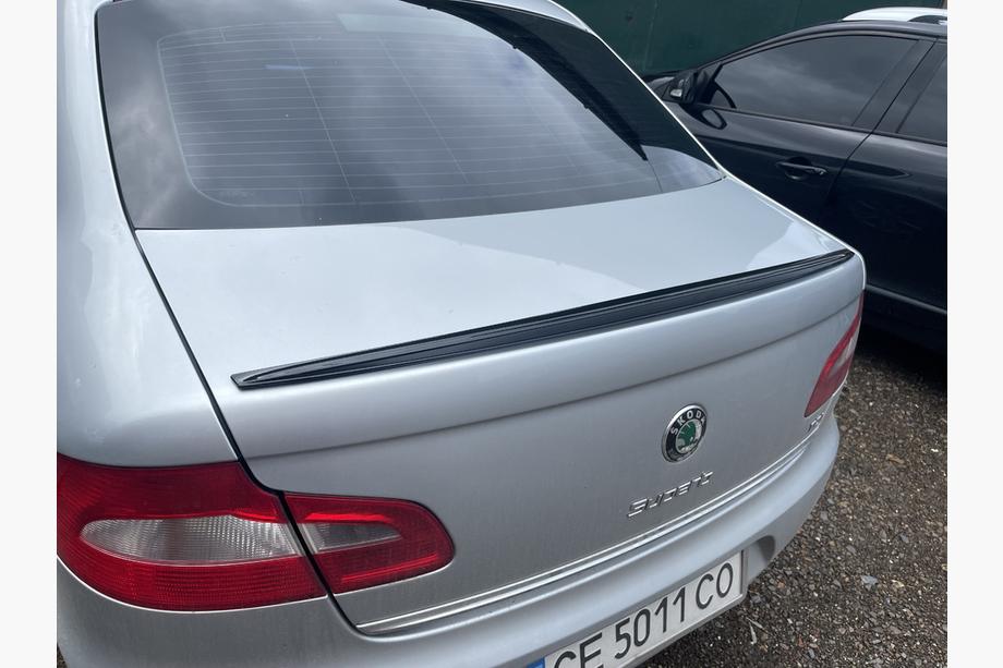 Skoda Superb 2009-2015 Alerón LIP (Sunplex, negro) (115,8cm x 6,3cm) Foto 1