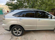 Lexus RX 2003-2009 Barras de techo Cromo turcas Pies de plastico foto 1