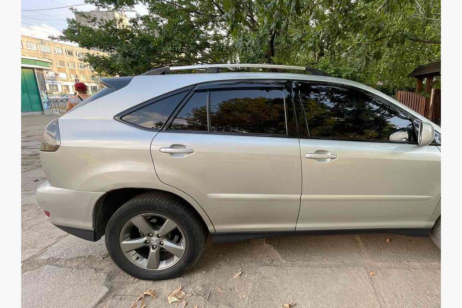 Lexus RX 2003-2009 Barras de techo Cromo turcas Pies de plastico Image